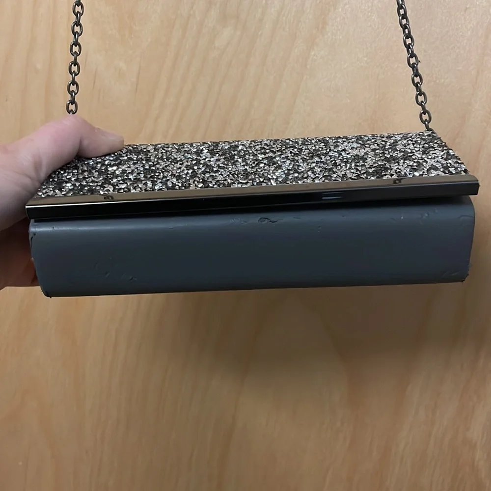 Saks Fifth Avenue sparkly gemstones clutch with chain link strap.